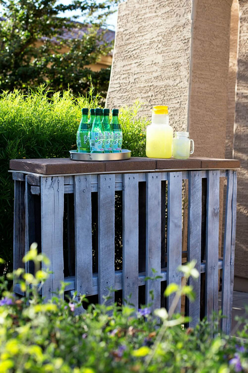 Pallet bar with drinks on top