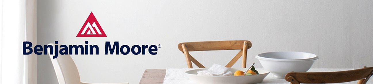 Benjamin Moore logo with a kitchen table setting background