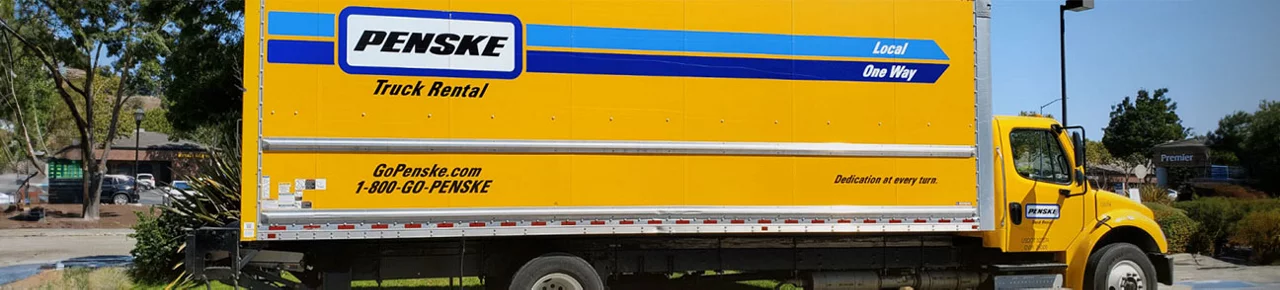 Side shot of a parked Penske Truck