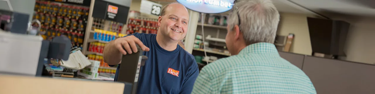 Employee helping customer in-store