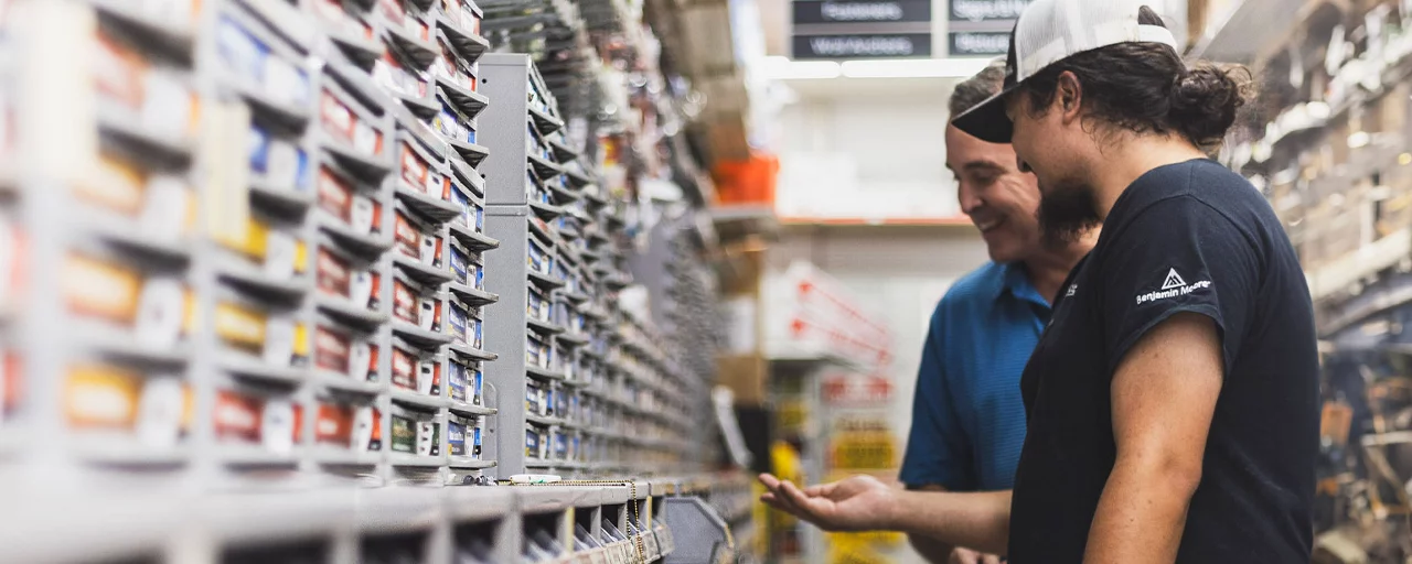 Employee helping customer in-store