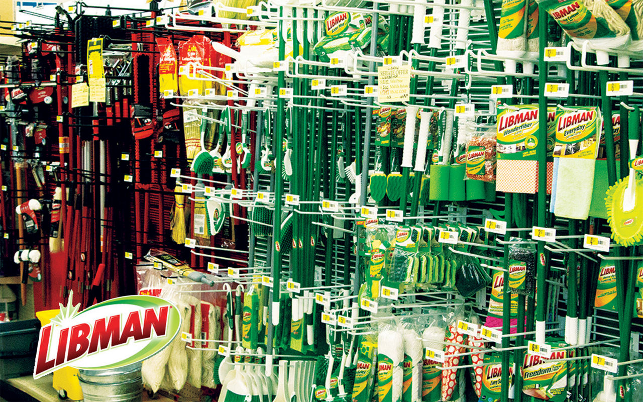 Wall of Libman cleaning supplies