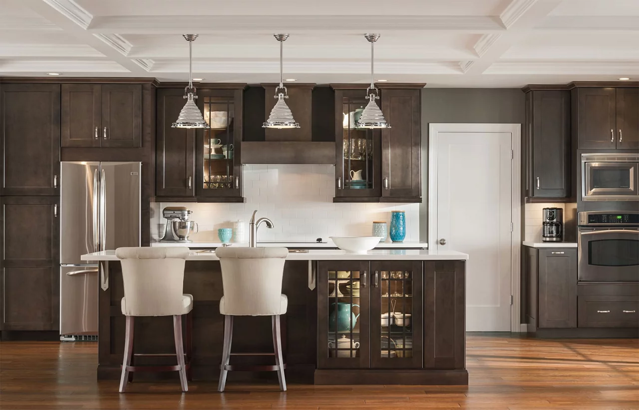 Modern kitchen with dark cabinets and an island