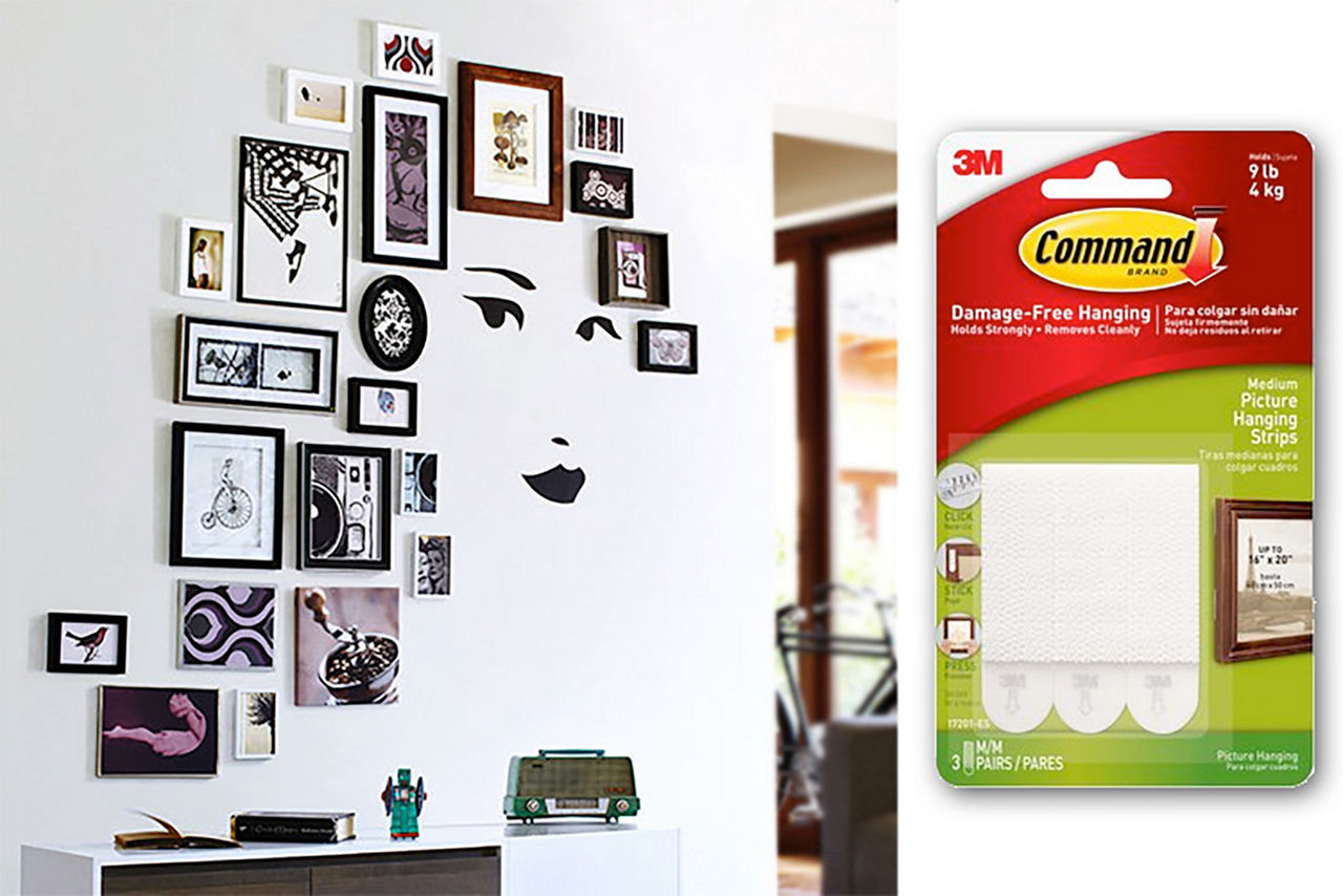 Photo of the picture hanging command strips with examples of photos on the walls
