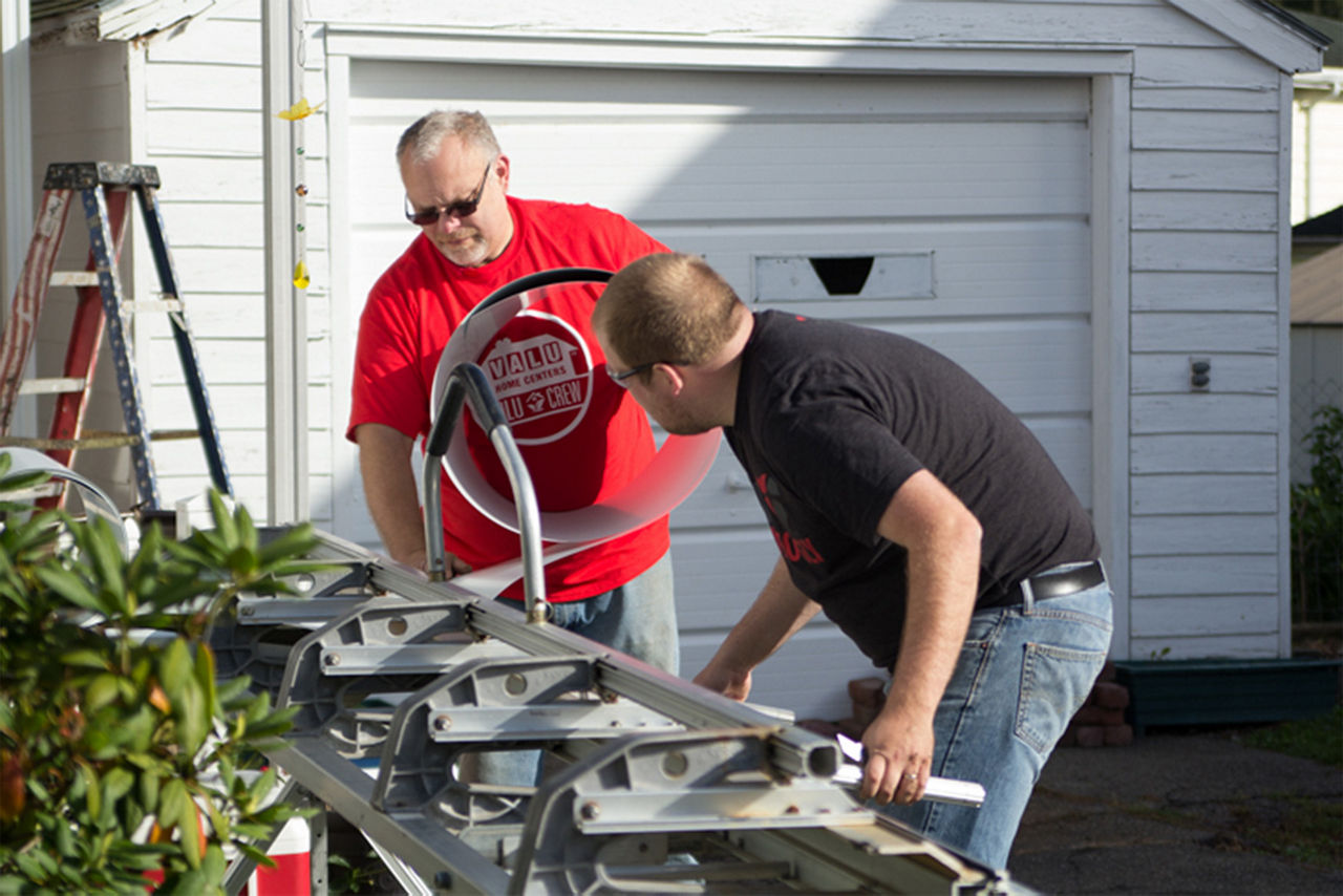 Men with big tools to prep items for the house