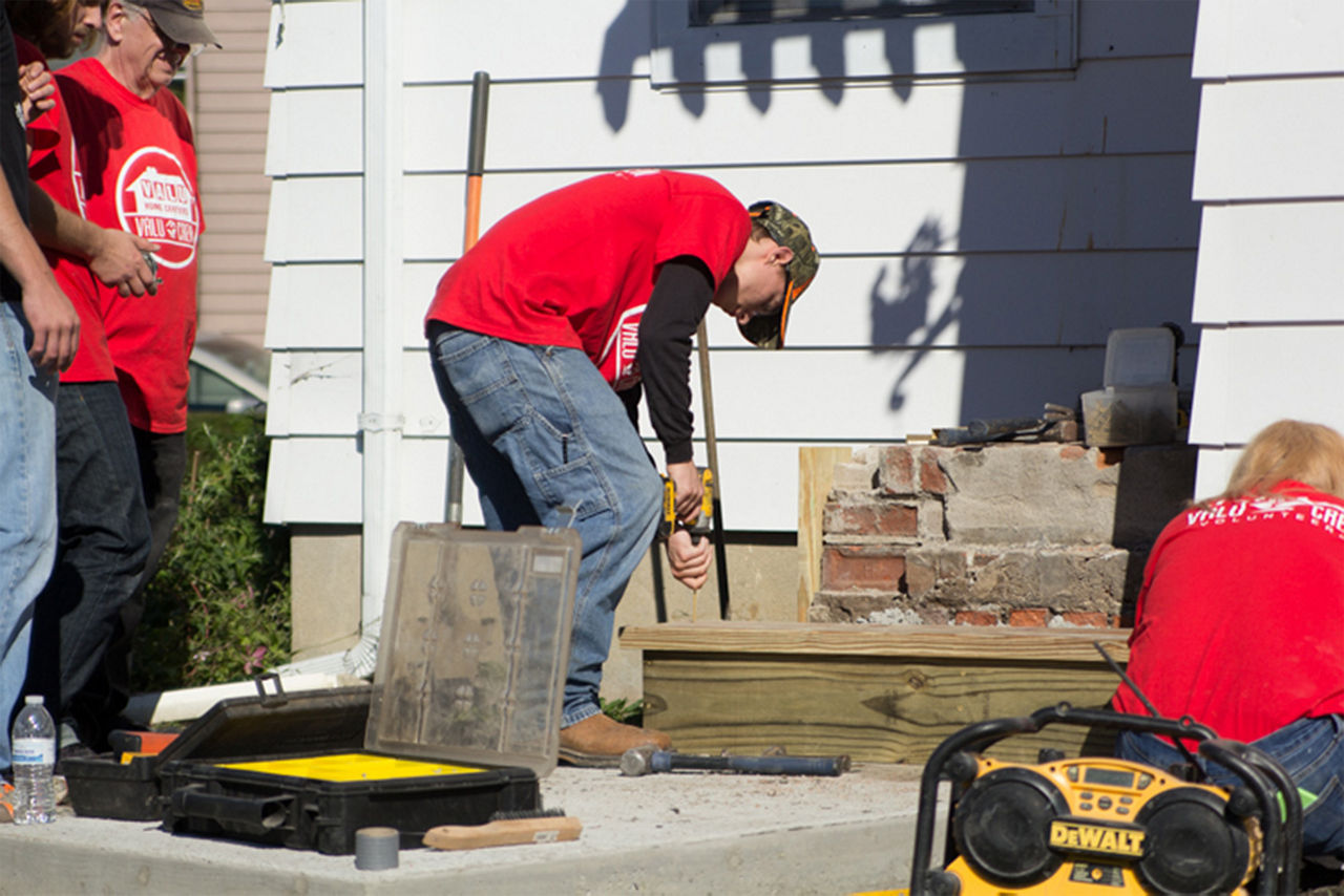 Man drilling with a dewalt tool for the house