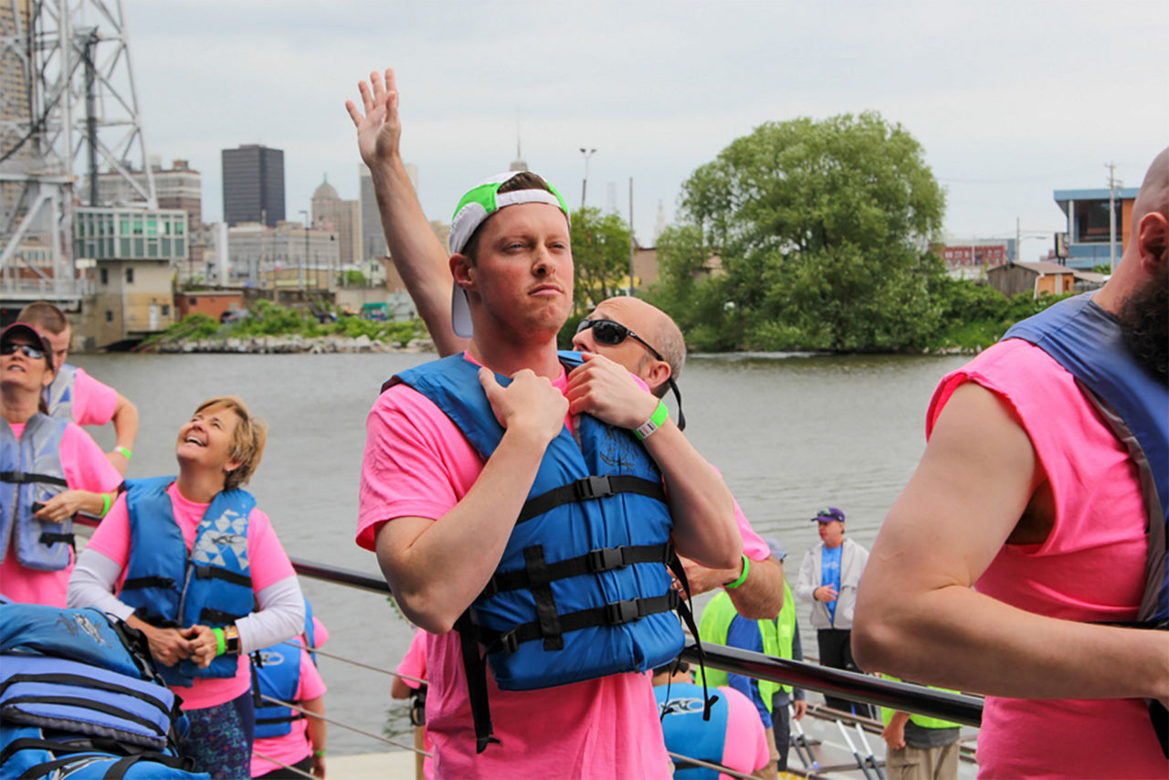 Man trying to be stoic on the dragon boat