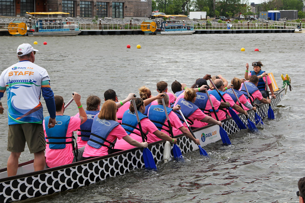 View of the Valu crew's backs as they are rowing