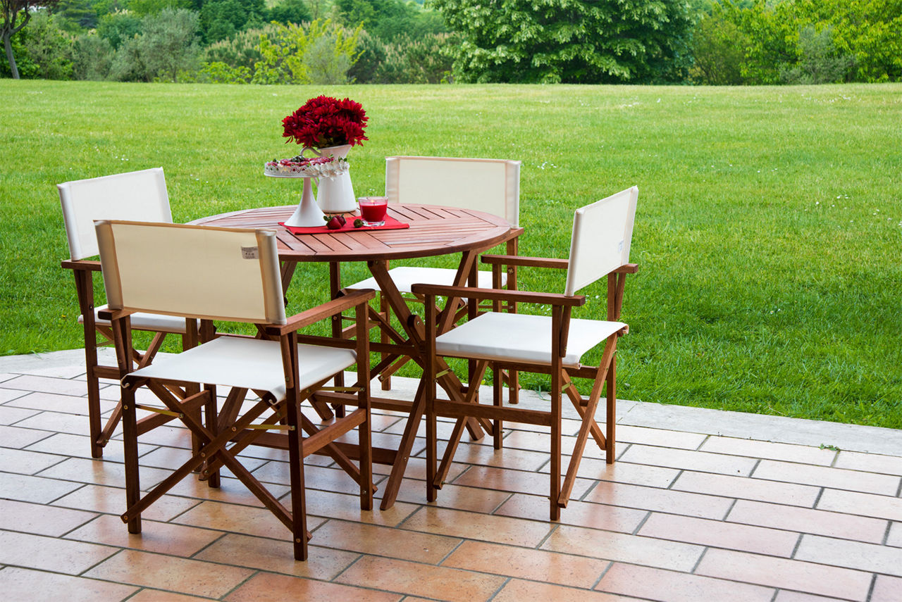 Polywood chairs and table outside in the spring