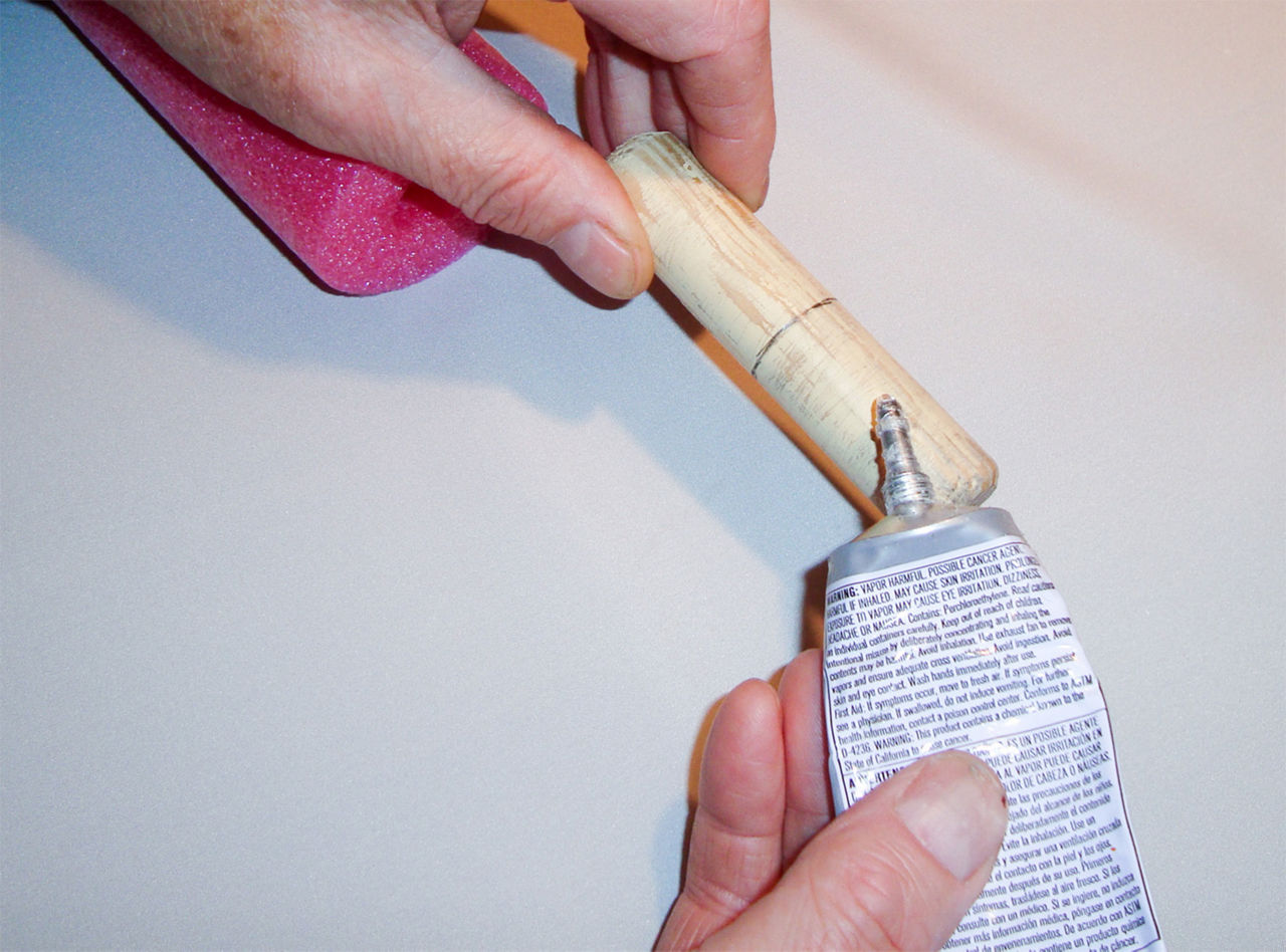 Image of step two; a pencil mark made half way on the dowel