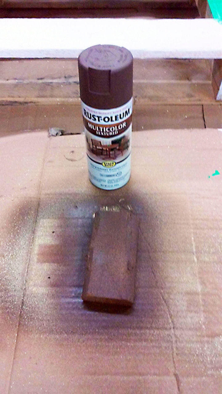 Brown Rust-Oleum painted on some wood to make the tree trunk