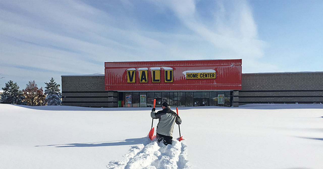 Valu storefront during a snow storm