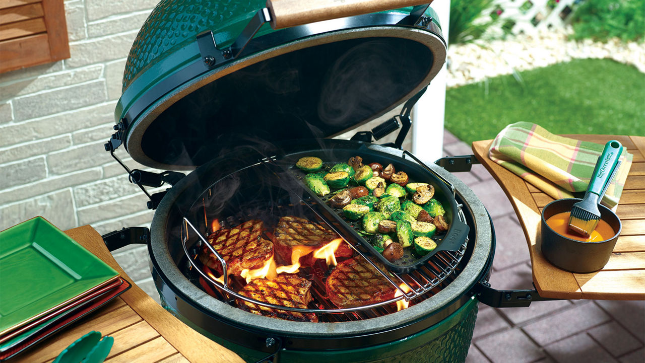 A grill extender on a Big Green Egg