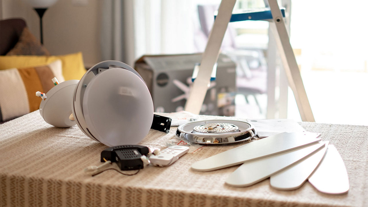 Ceiling fan parts sitting on a table