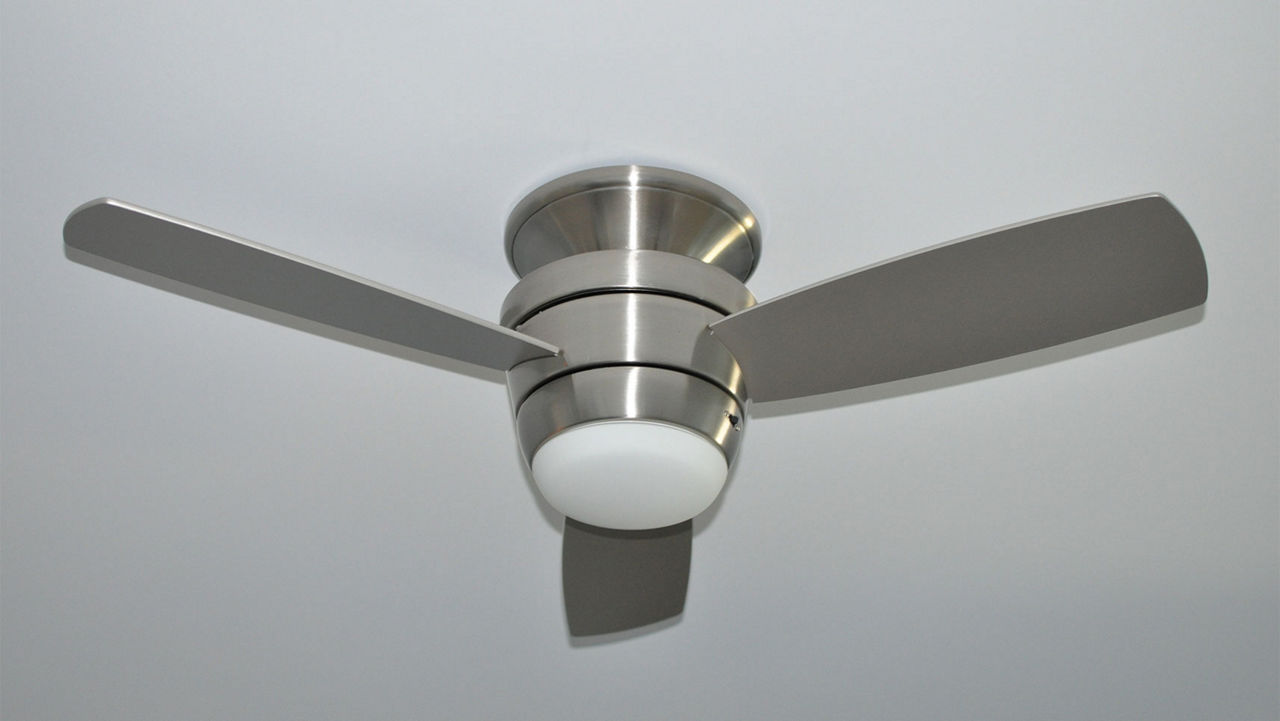 A flush mounted ceiling fan