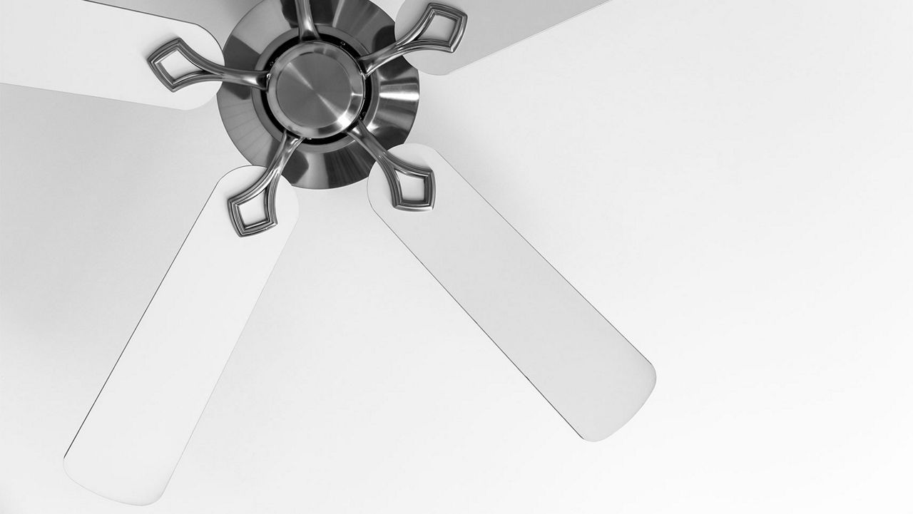 A stylish silver ceiling fan 