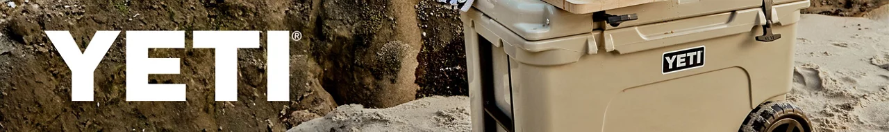 Yeti logo on the left hand side with a lifestyle of a hard yeti cooler