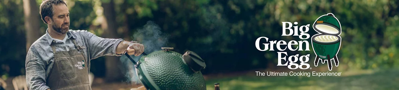 Man Cooking on a Big Green Egg with logo on the right hand side 