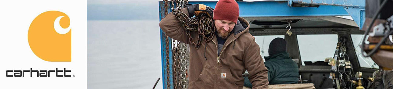 Man Holding Chains In a Carhartt Jacket On a Boat 