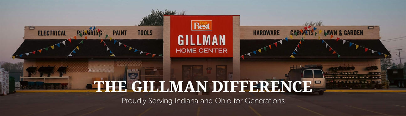 Gillman Home Center store front. The building is tan with black awnings and in the center above the double entrance doors is a sign that says "Gillman Home Center"