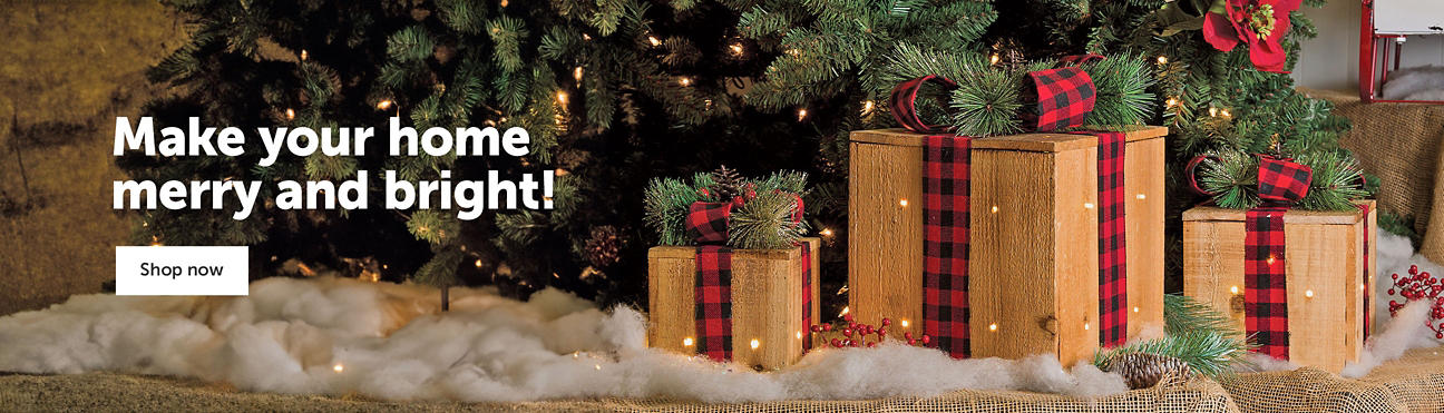 Text on the left, "Make your home merry and bright!" A "Shop Now" button with a three burlap presents under a Christmas tree