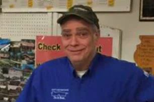 Bob Wearing a Ball Cap & Blue Button Down Work Shirt