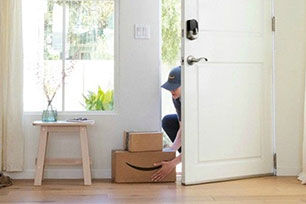 Delivery person dropping packages off inside the door
