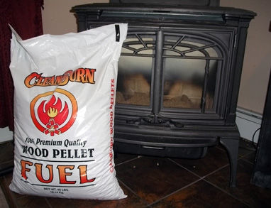 clean burn wood pellets in front of heating stove