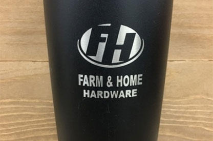 Black Tumbler engraved with Farm & Home Hardware