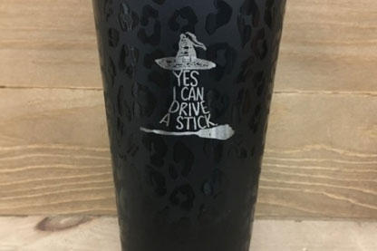 Black tumbler engraved with "yes I can drive a stick"