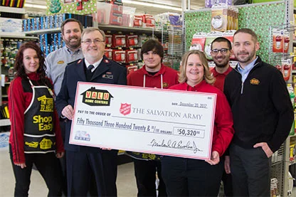 Valu presenting check to The Salvation Army