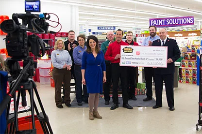 Valu presenting check to The Salvation Army