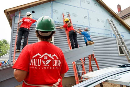 Valu volunteers working on Habitat for Humanity's 300th house