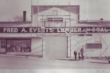 Sunday morning after church about 1954. John, Peter and Tom Everts posed showing exterior remodel job.