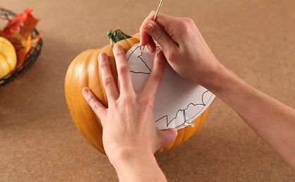Tracing a pattern on to a pumpkin