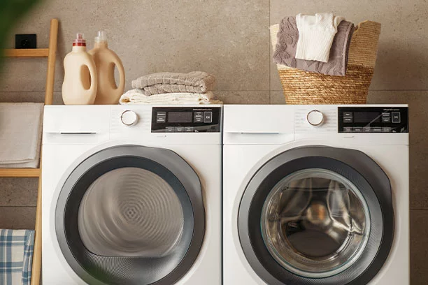 White washer and dryer in laundry room