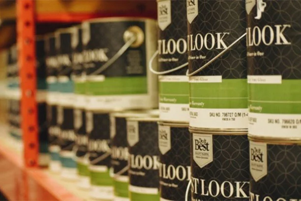 Best Look paint cans on a shelf