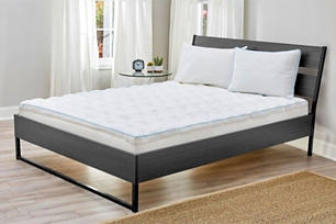 A Therapedic mattress in a bedroom