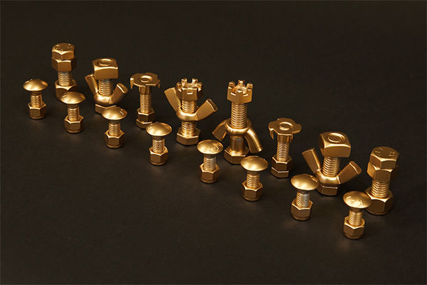 Chess pieces spray painted gold