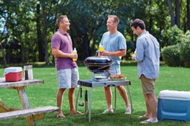Three Men With a Portable Grill