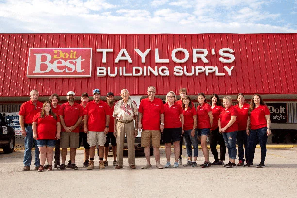 Emploee group photo in front of Taylor's Building Supply