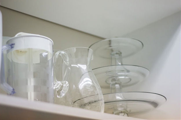 Glass items on a pantry shelf