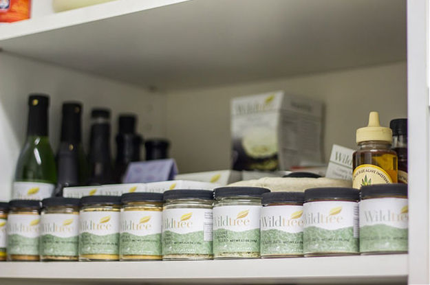 Spices and oil on a pantry shelf
