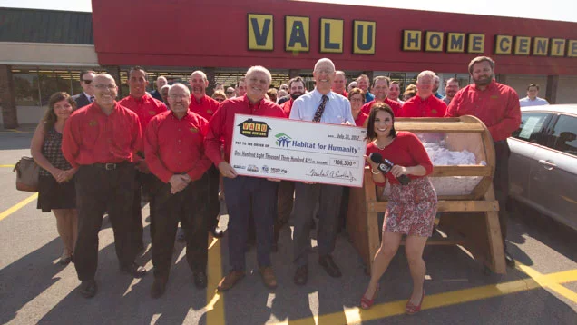 Group photo from check presentation to Habitat for Humanity