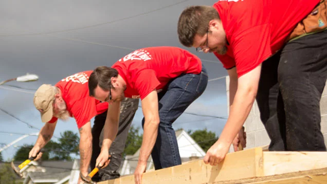 Three Valu men working