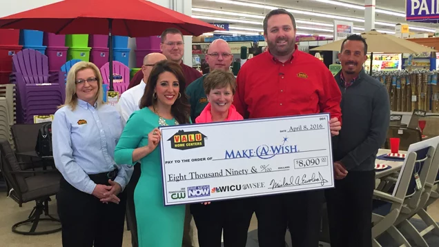 CHeck presentation with Valu and Make-A-Wish representives for Erie area