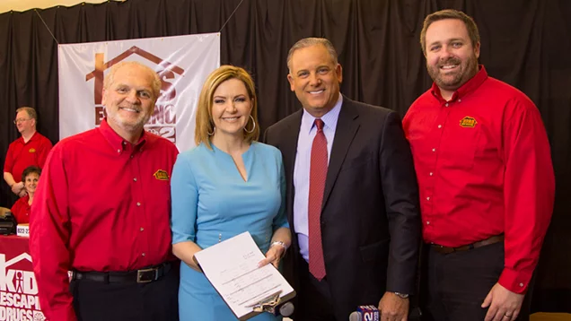 Valu representatives pictured with WGRZ - Channel 2 Buffalo news reporters