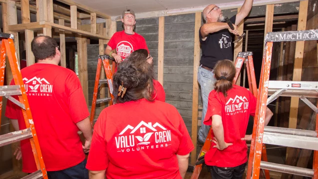 A group of Valu Crew volunteers working