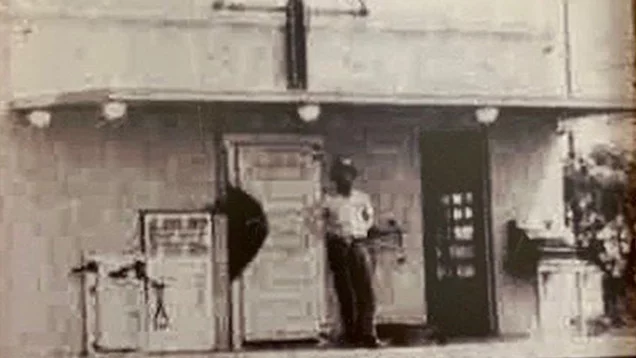 Man in Front of Gas Station