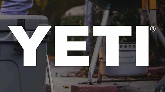 YETI logo with YETI cooler in background